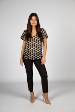 Polka dot shirt with side buttons