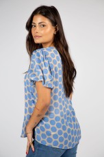 Polka dot shirt with side buttons