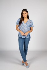 Polka dot shirt with side buttons