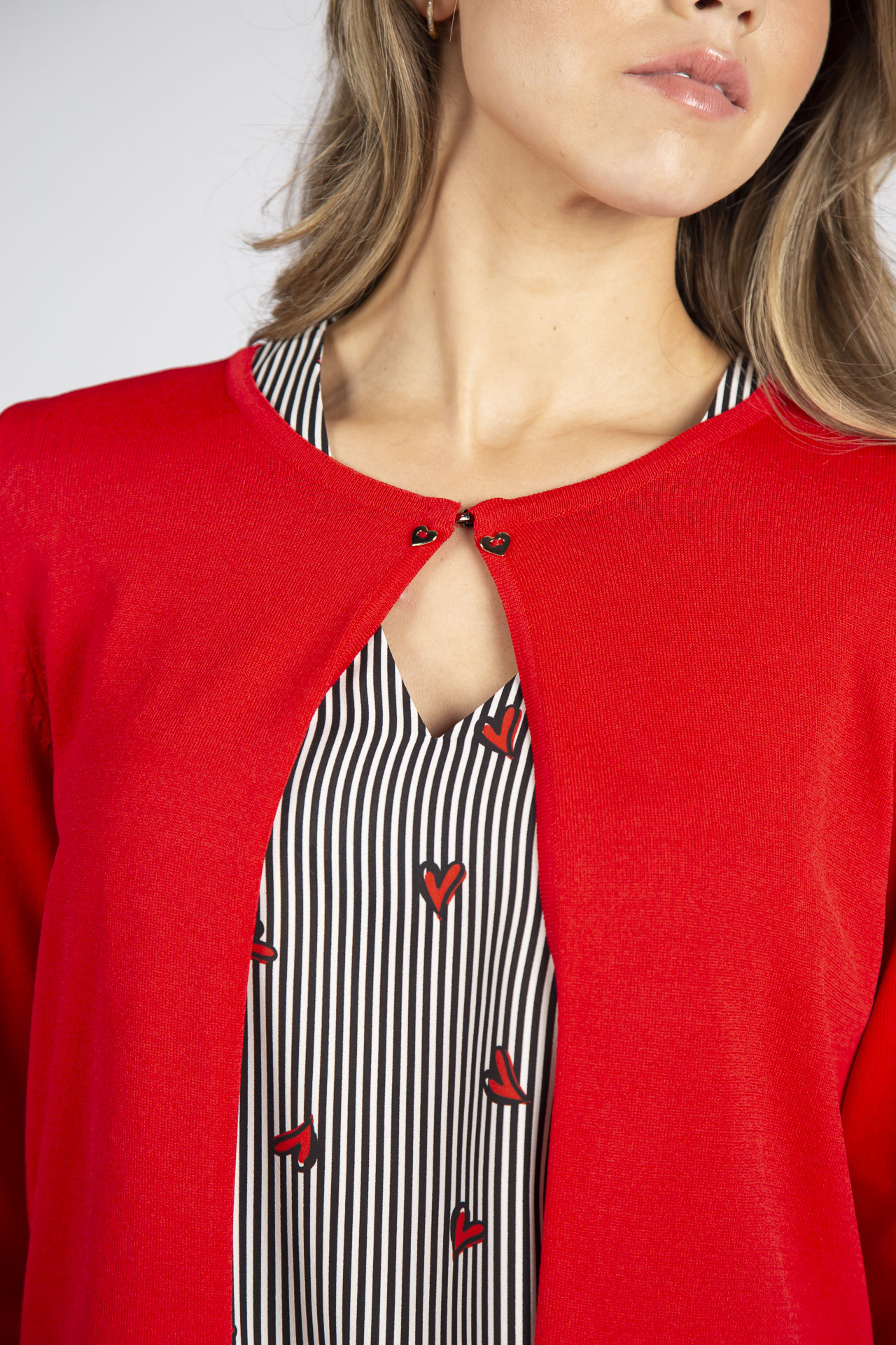 Knitted jacket with hook fastening