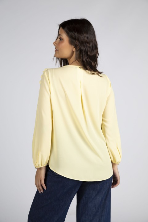 Tnica con flor tridimensional 