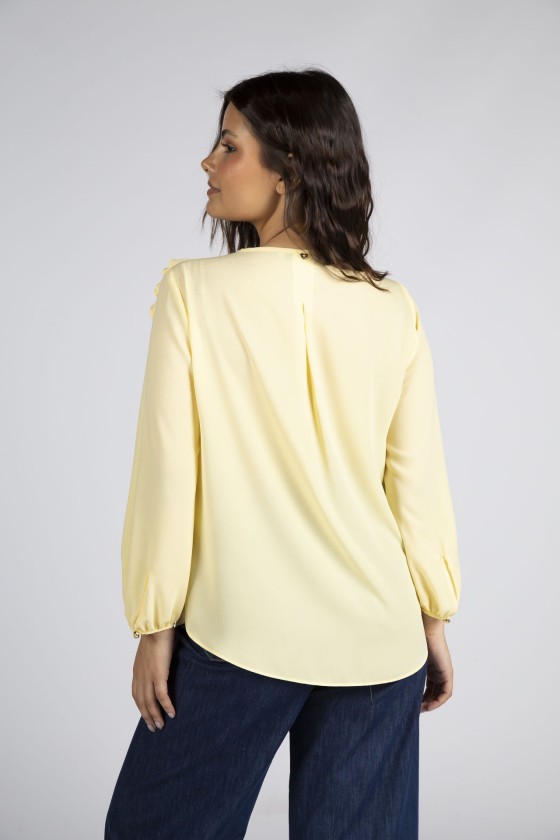 Tnica con flor tridimensional 