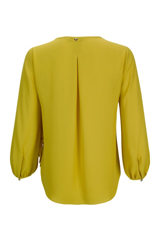 Tnica con flor tridimensional 