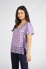 Polka dot shirt with side buttons