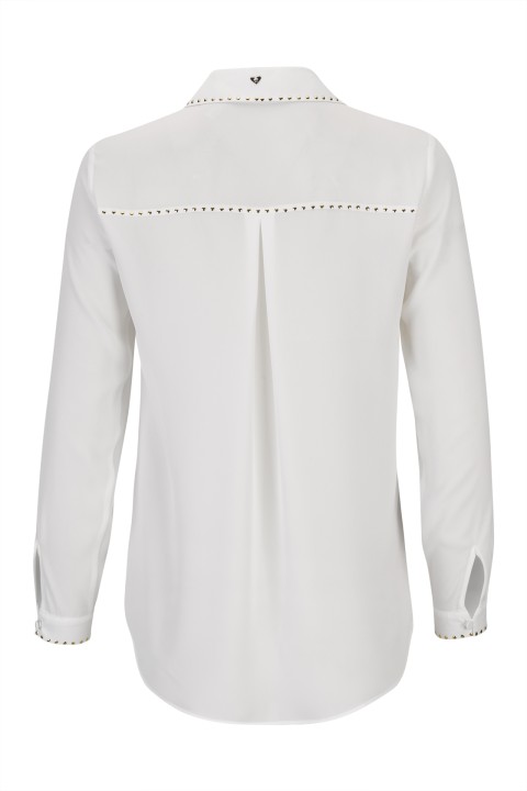 Blusa con tachuelas doradas