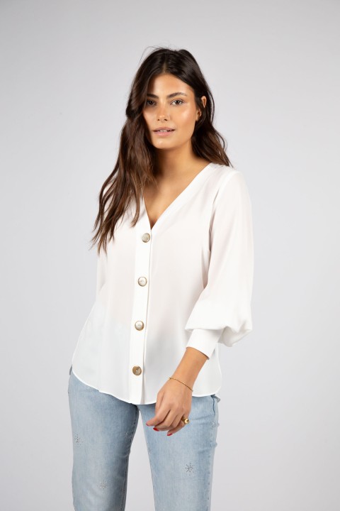 Blusa de mangas compridas e decote em v