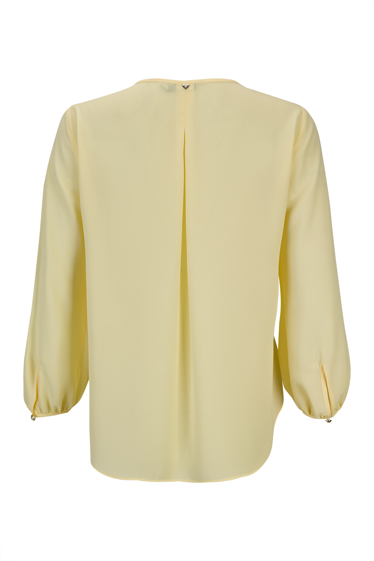 Túnica con flor tridimensional