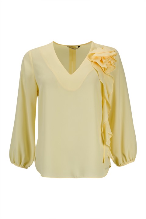 Tnica con flor tridimensional 