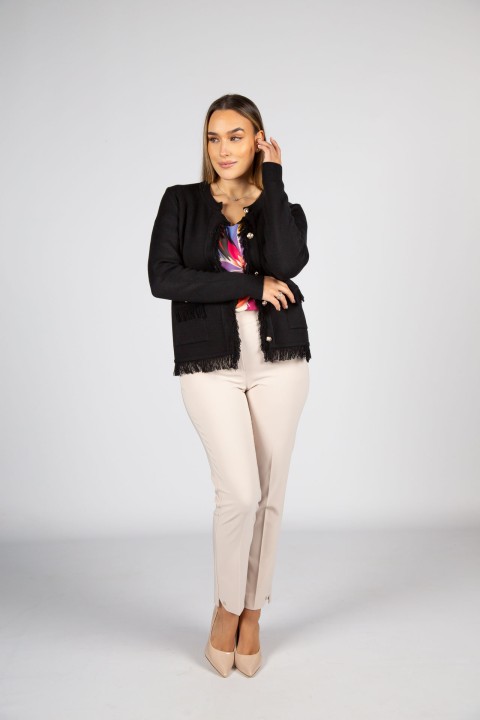 Knitted jacket with fringes