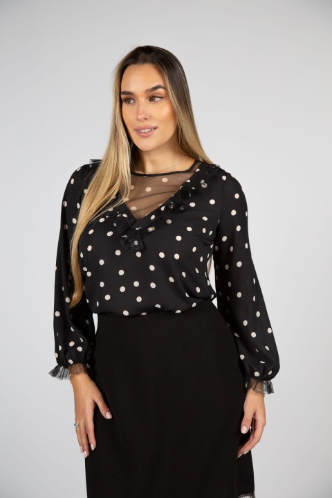 Polka dot blouse with transparency 