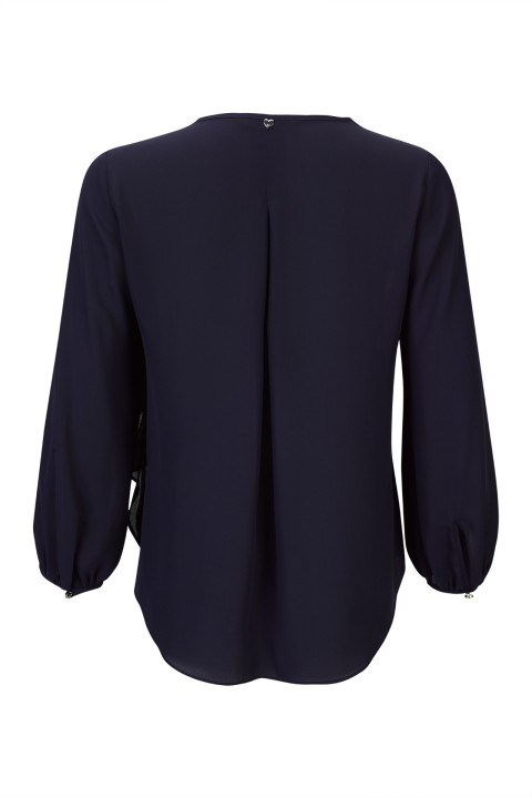 Tnica con flor tridimensional 