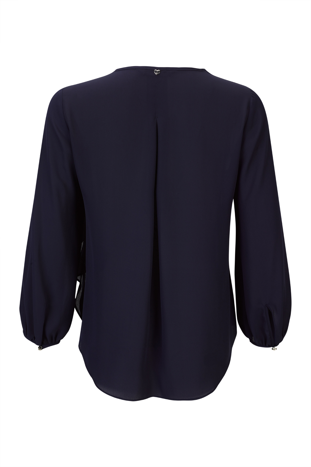 Túnica con flor tridimensional