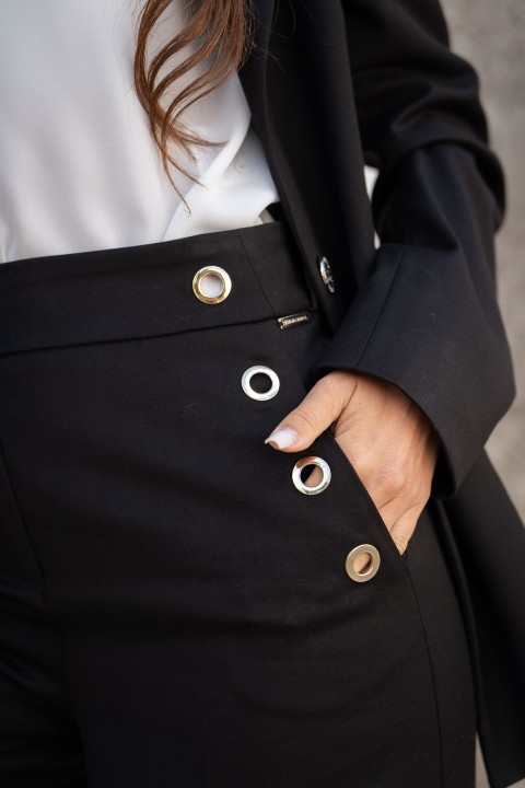 Pantalones anchos con ojales