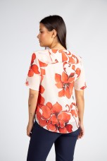 Blouse with ruffles and lined buttons