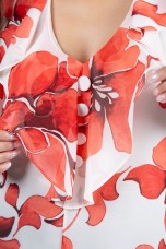 Blouse with ruffles and lined buttons