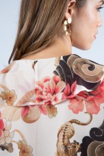 Blouse with ruffles and lined buttons