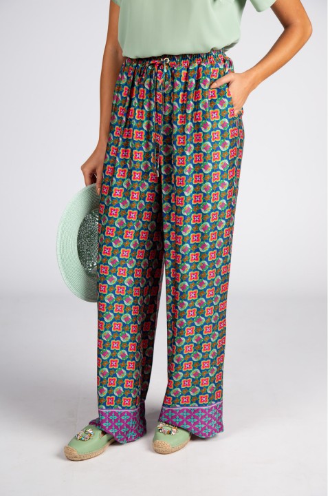 Pantalones palazzo con estampado tnico