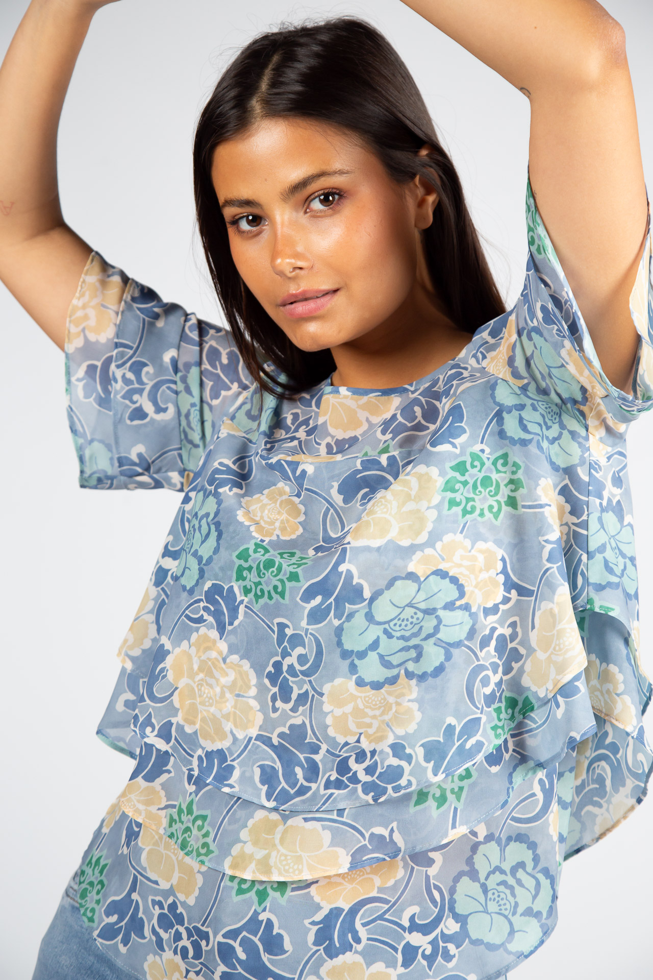 Blouse with overlapping layers