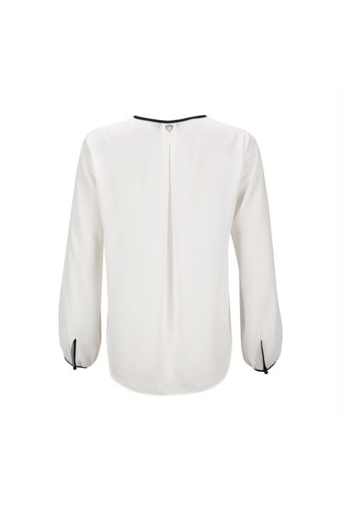 Tnica con botones forrados