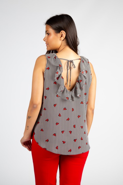 Sleeveless top with ruffle Sleeveless top with ruffle