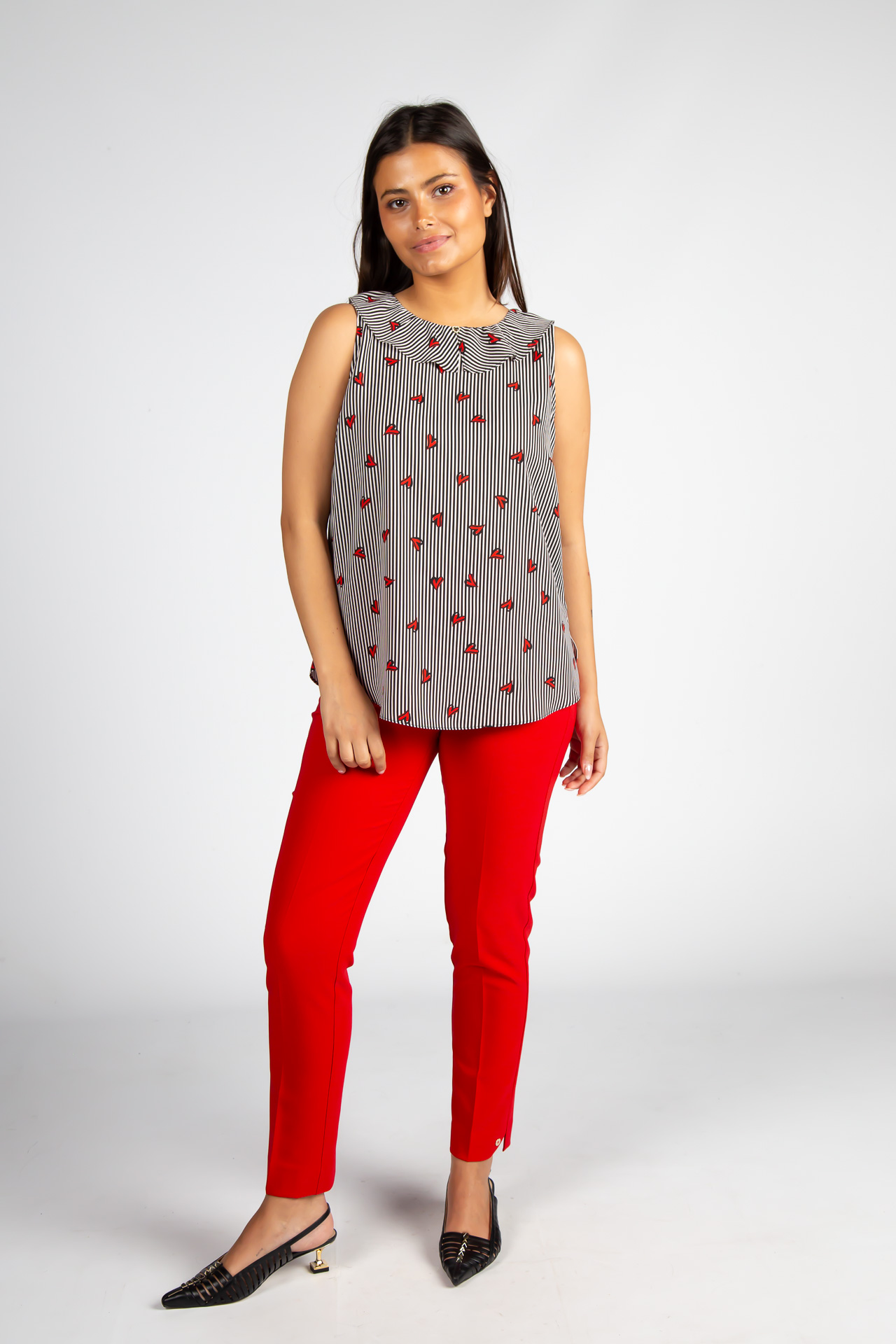 Sleeveless top with ruffle