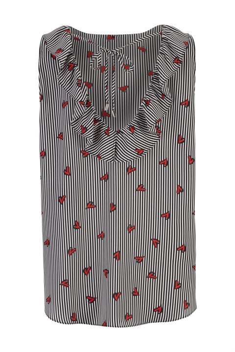 Sleeveless top with ruffle Sleeveless top with ruffle