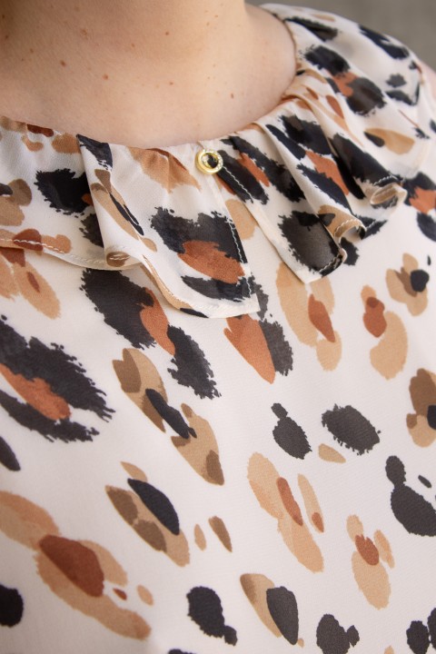 Top sem mangas com folho