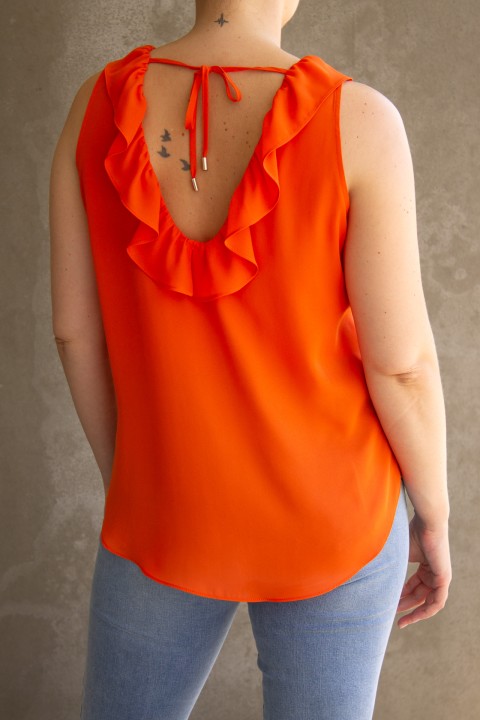 Sleeveless top with ruffle