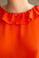 Sleeveless top with ruffle