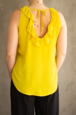 Sleeveless top with ruffle