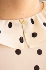 Sleeveless top with ruffle