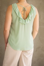 Sleeveless top with ruffle