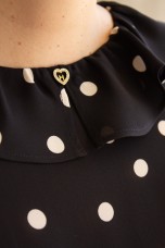 Sleeveless top with ruffle