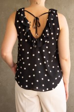 Sleeveless top with ruffle