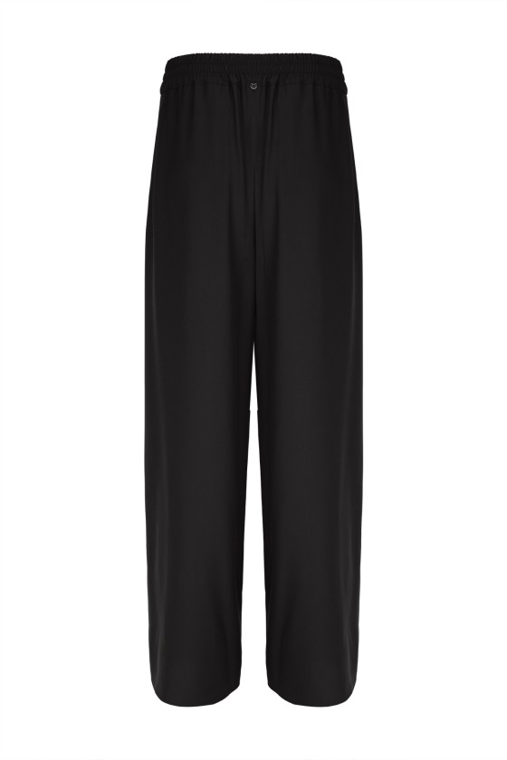 Pantalones con pliegues