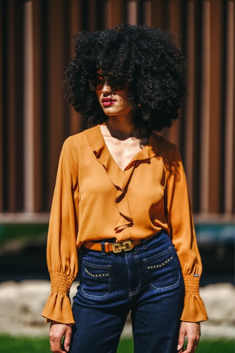 Blouse with ruffles and elasticated cuffs