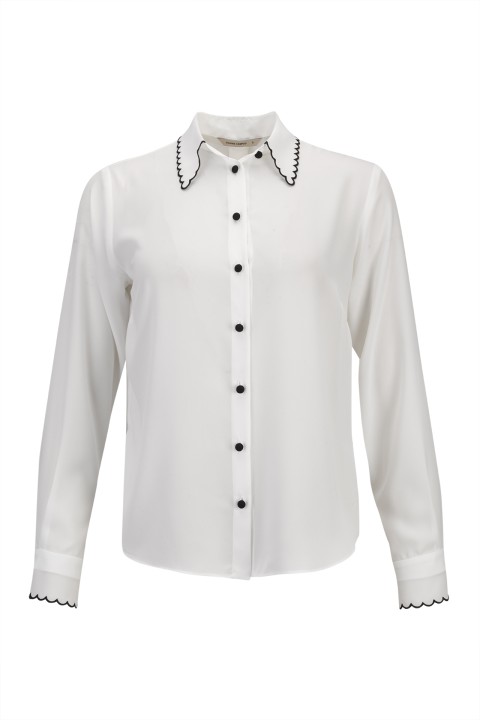Blusa con contrastes Blusa con contrastes