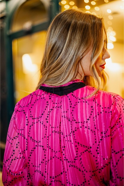 Túnica de mangas largas con puños plisados Túnica de mangas largas con puños plisados