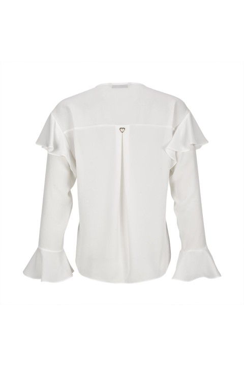 Tnica de manga larga y botones forrados