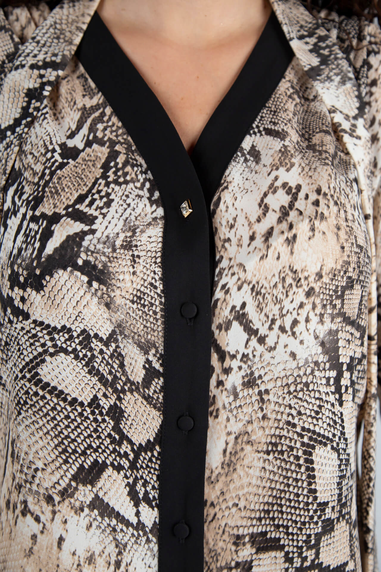 V-neck blouse with bow