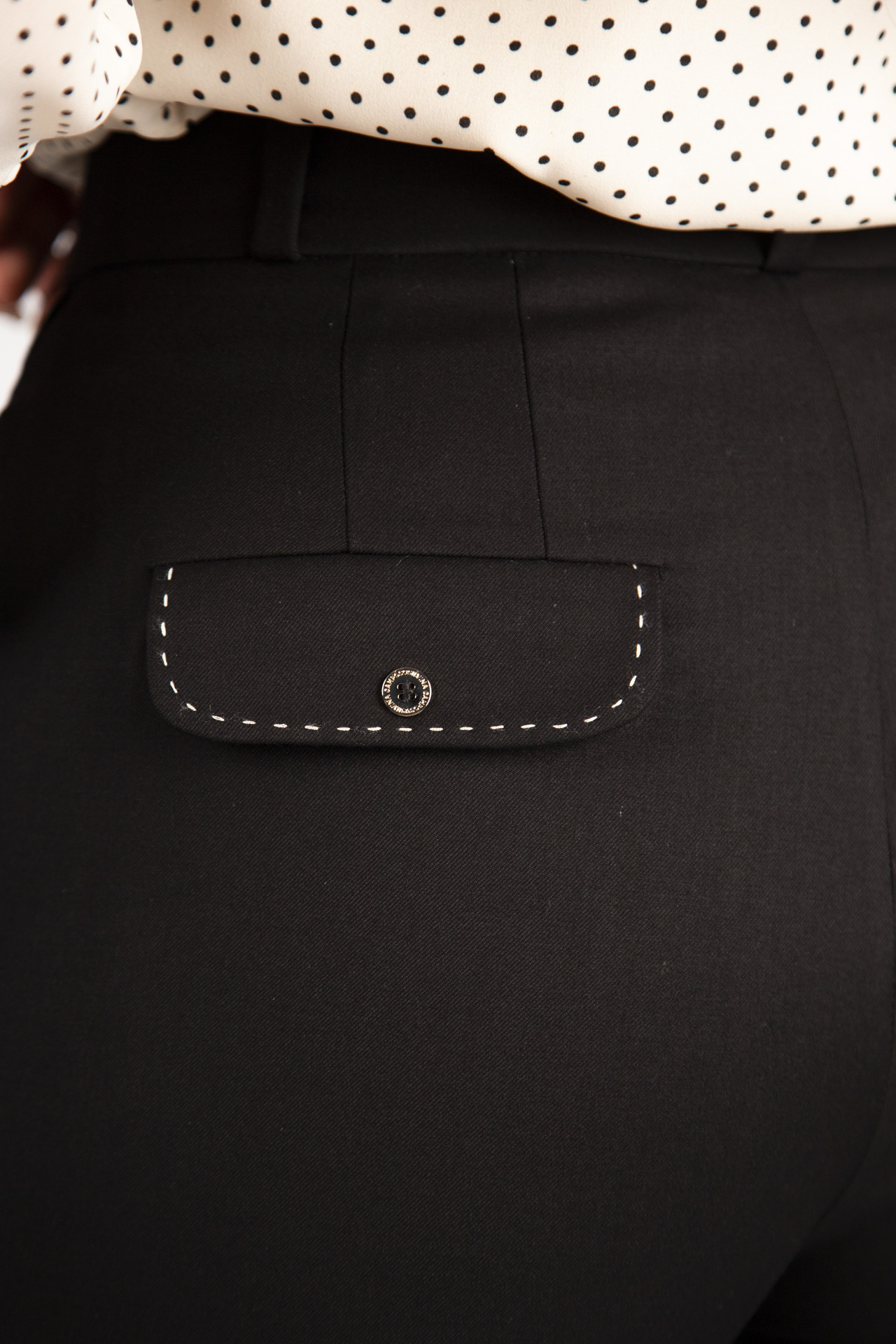 Trousers with contrasting topstitching detail