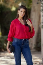 Blouse with ruffles and elasticated cuffs