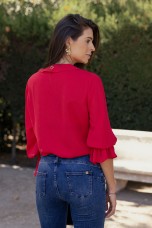 Blouse with ruffles and elasticated cuffs