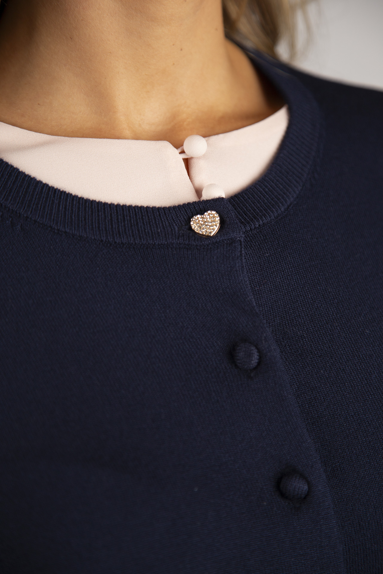 Casaco de malha botões forrados