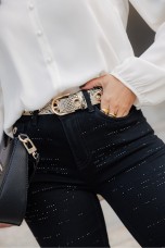Belt with metallic eyelets