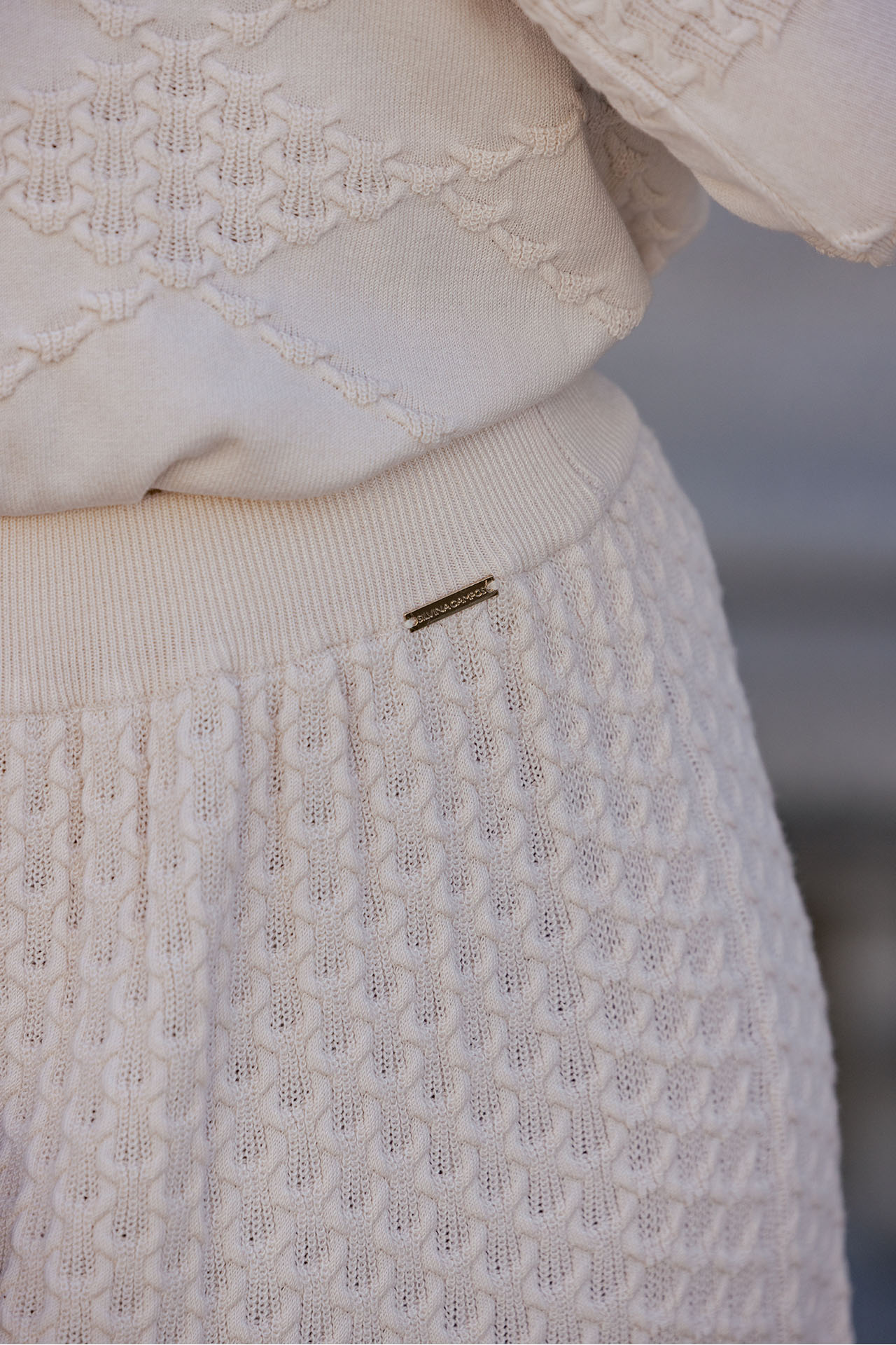 Long skirt with embossed pattern