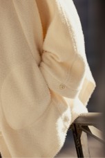 Poncho-style knitted coat
