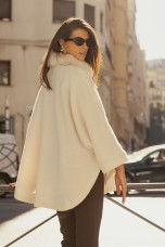 Poncho-style knitted coat