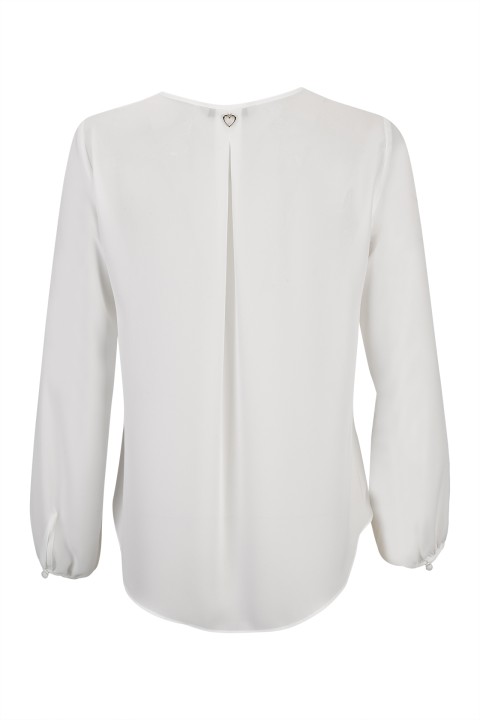 Tnica con botones forrados