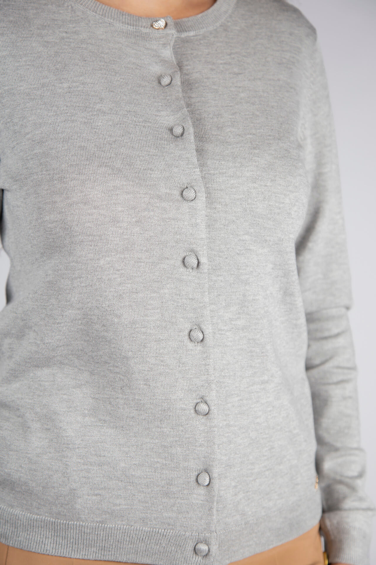 Casaco de malha botões forrados